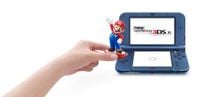 Official artwork of an amiibo scanning on the New Nintendo 3DS XL