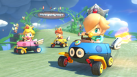 Baby Rosalina drives through Cloudtop Cruise in Mario Kart 8.