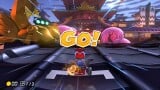 The finish line with Mii performing a Rocket Start to begin the race