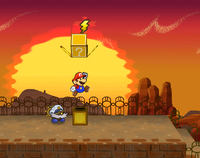 Screenshot of Mario revealing a hidden ? Block (containing a Thunder Rage) in Riverside Station, in Paper Mario: The Thousand-Year Door.