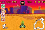 Yoshi racing on Choco Island 1 in Mario Kart: Super Circuit.