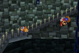 Mario and Kooper falling down a trap