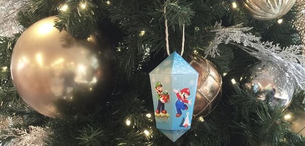 Presentation photograph of a printable Mario-themed holiday ornament