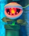 A Fire Piranha Plant in Super Nintendo World.