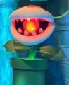 An animatronic Fire Piranha Plant in Mario Kart: Bowser's Challenge at Super Nintendo World