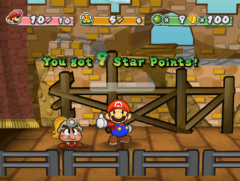 Screenshot of Mario earning 9 Star Points from Lord Crump, in Paper Mario: The Thousand-Year Door.