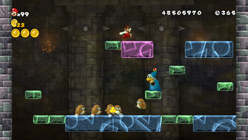 Mario battles Magikoopa at his tower.