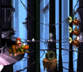The three heroes stand near a platform and a wall of Zingers.